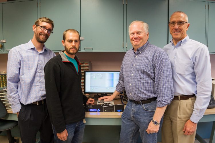 Kratos donates channel simulator to UCCS Engineering Lab, features a group photo