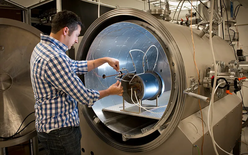 student working in a mechanical and aerospace lab