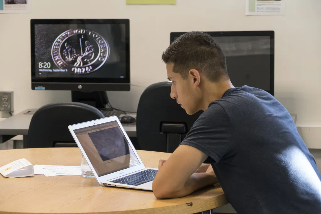 student working on their computer