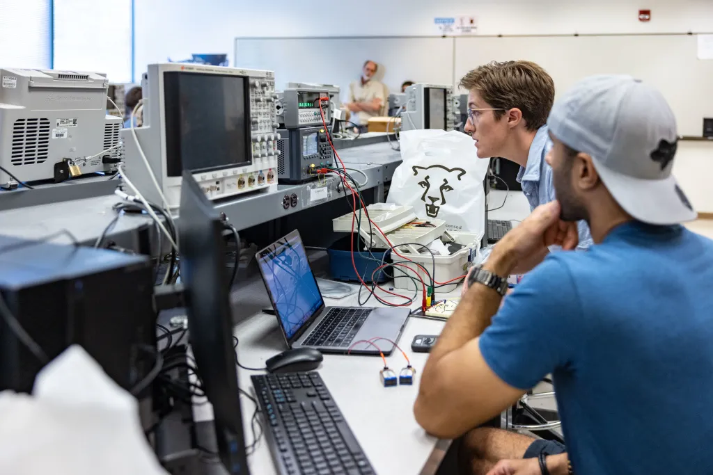 Engineering Students working together in the Computer Science Lab on UCCS Campus