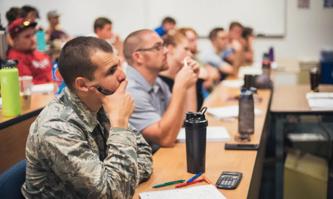 students sitting in a classroom together