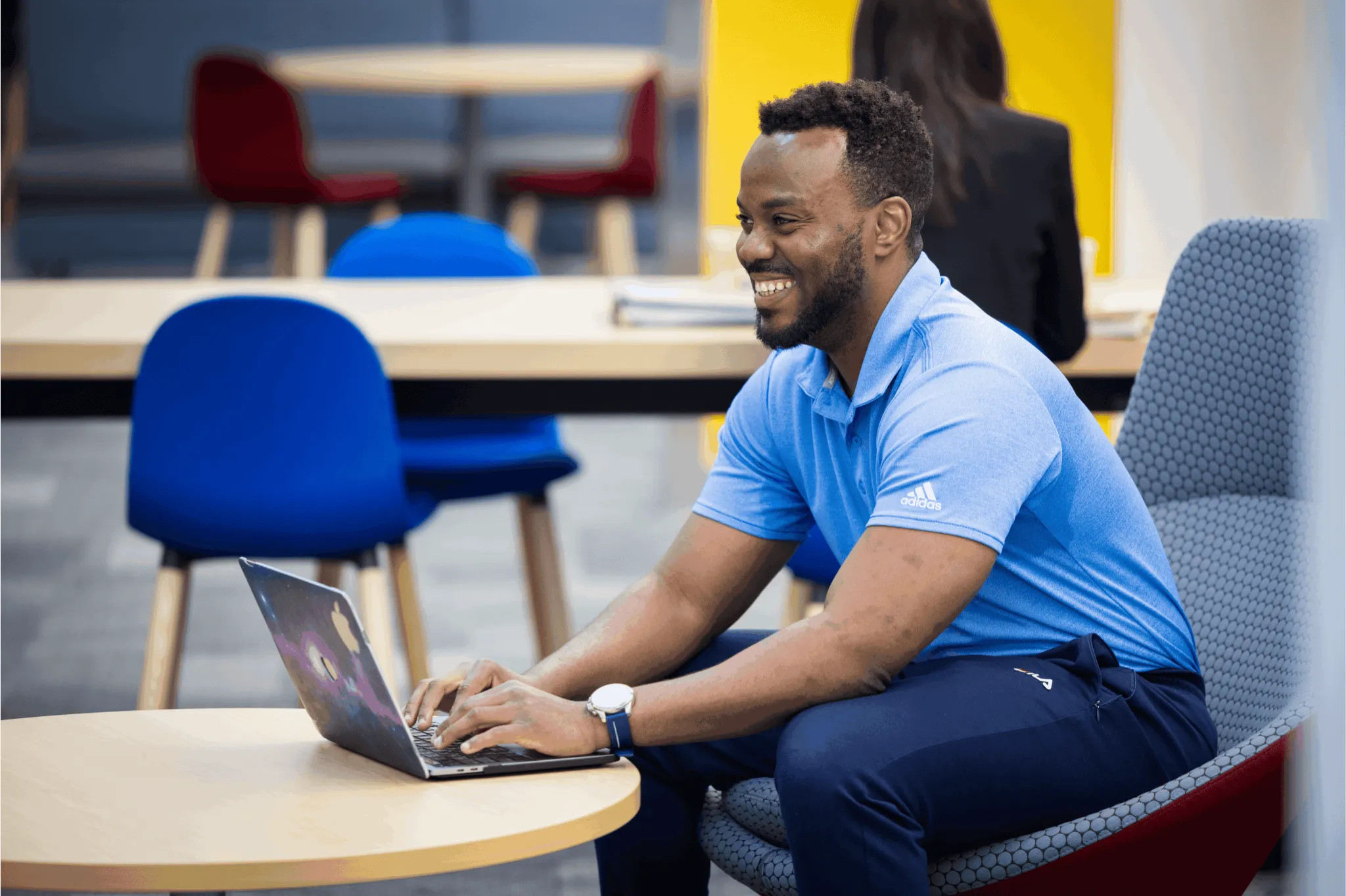 Man typing on computer